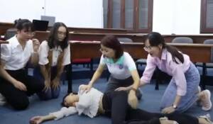 Place the victim in a side-lying position, which is the recovery position.